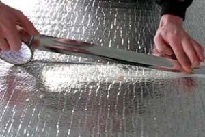 Процесс укладки утеплителя